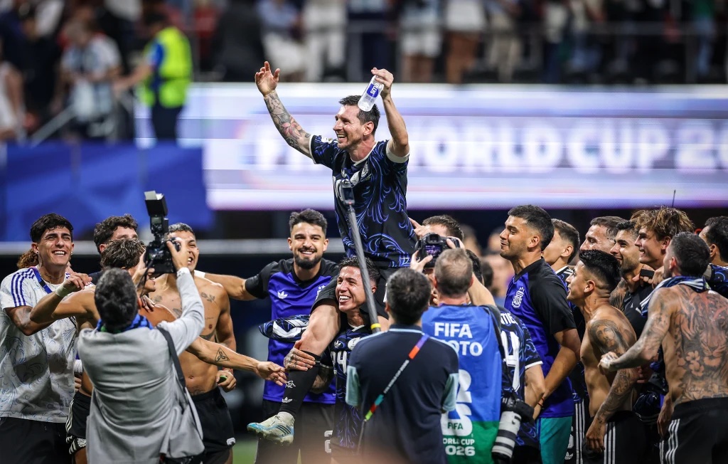 Lionel Messi celebrates Argentina's victory over England.