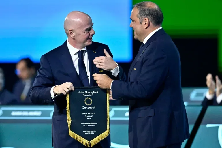 FIFA President Gianni Infantino and Concacaf President Victor Montagliani stand together during an official event.