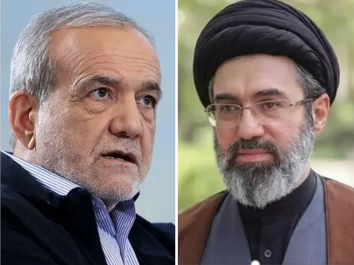 Mojtaba Khamenei and President Masoud Pezeshkian stand together during a formal government meeting.
