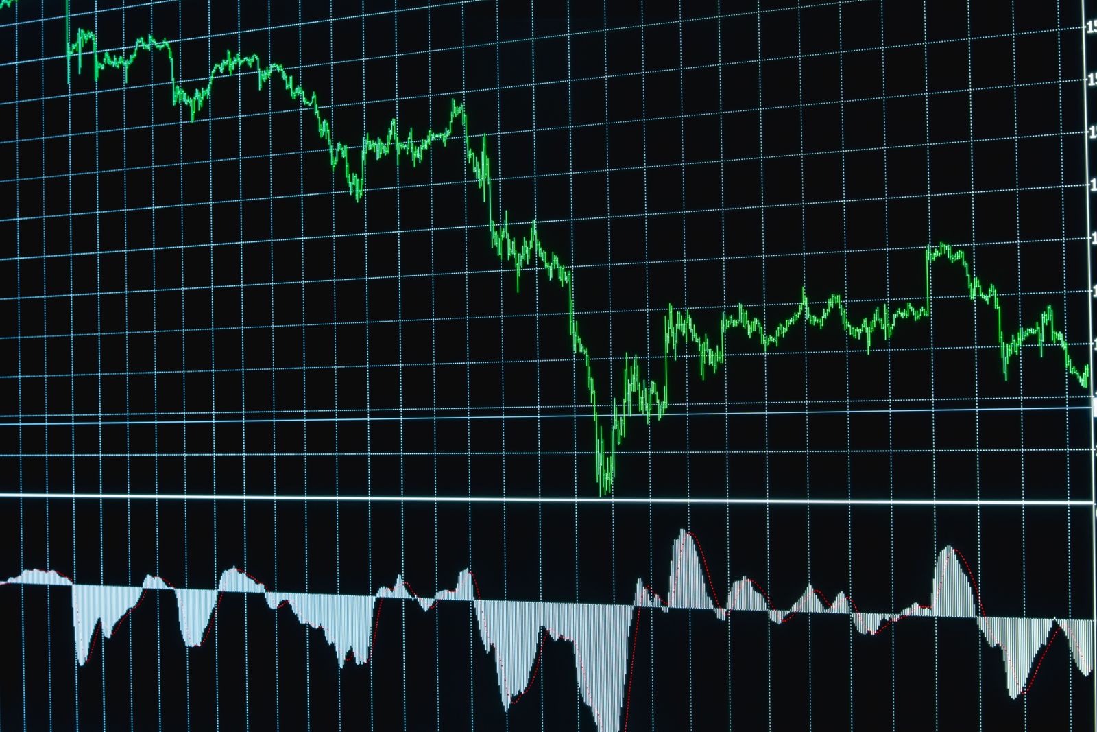 Pedestrians walk past a colorful mural of the Iranian flag painted on a weathered brick wall in a busy city.