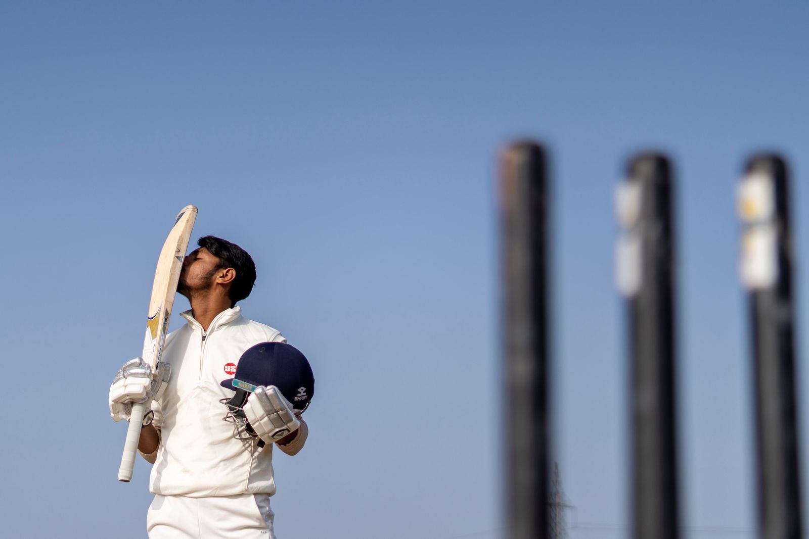 Mohammad Abbas follows through his bowling action during a cricket match on the green grass at Lord’s.