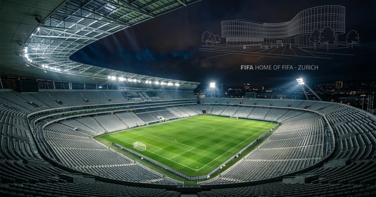 A low-angle view of the FIFA headquarters building in Zurich under a clear blue sky during the daytime.